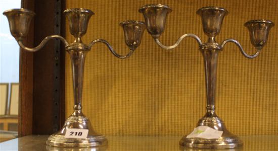 Pair of silver candelabra